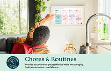Load image into Gallery viewer, Child using the Skylight 15-inch digital family calendar to track chores and build morning routines on a wall-mounted smart screen.